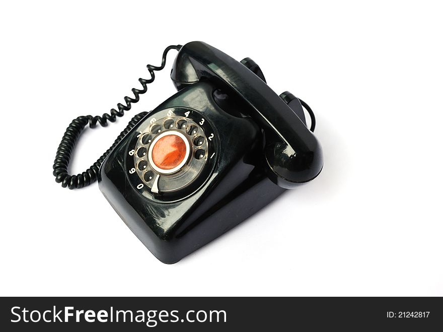 Image old telephone on the white background