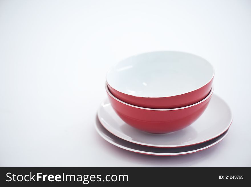 Red and white plates and bowls