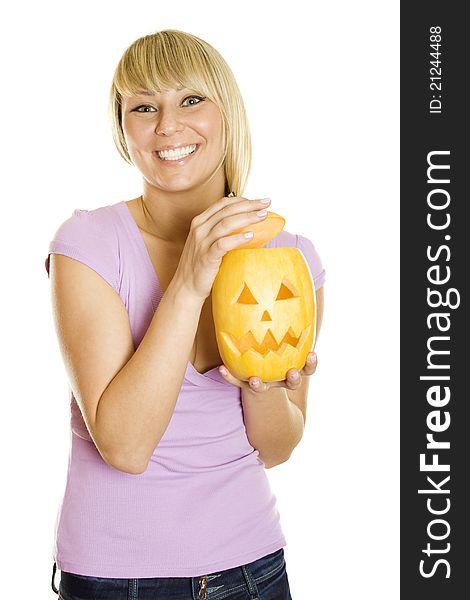 Young girl having fun with a pumpkin on Halloween. Lots of copyspace and room for text on this isolate. Young girl having fun with a pumpkin on Halloween. Lots of copyspace and room for text on this isolate