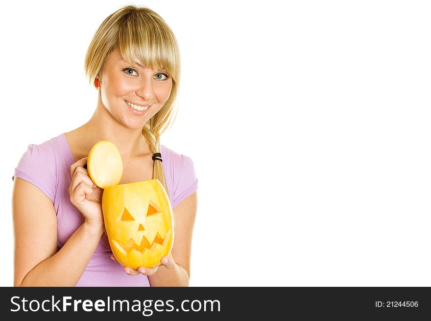 Young girl having fun with a pumpkin on Halloween. Lots of copyspace and room for text on this isolate. Young girl having fun with a pumpkin on Halloween. Lots of copyspace and room for text on this isolate