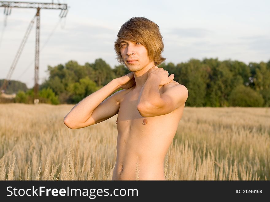 man walking in field in summer. man walking in field in summer