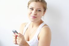 Teenage Girl With A Mobile Phone In Her Hand Royalty Free Stock Photography Teenage Girl With A Mobile Phone In Her Hand Royalty Free Stock Photography