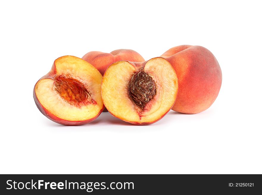 Sliced freshness peach fruits on white background. Isolated with clipping path