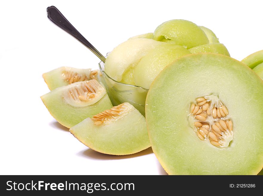 Close view of some sliced rock melon to serve as a fresh dessert isolated on a white background. Close view of some sliced rock melon to serve as a fresh dessert isolated on a white background.