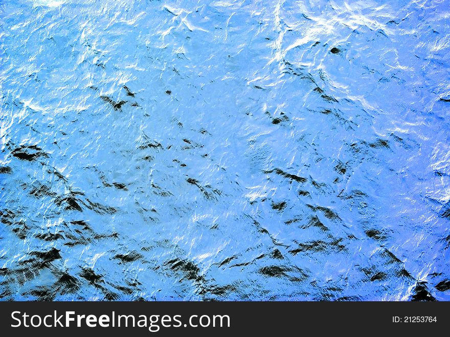 A full frame image of the sea showing the water texture. A full frame image of the sea showing the water texture.