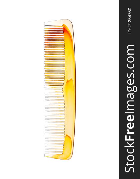 Plastic comb for hair over white background