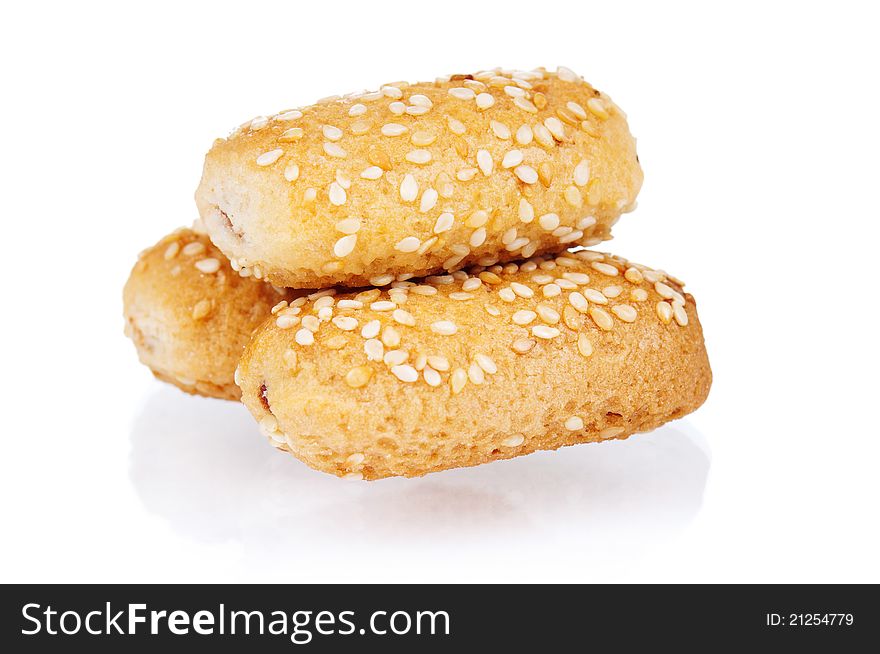 Pile of delicious cookies over white background