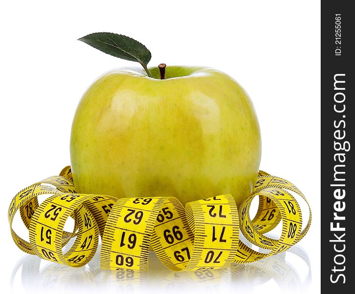 Fresh ripe apple with a measure tape wrapped around on a white background. Fresh ripe apple with a measure tape wrapped around on a white background
