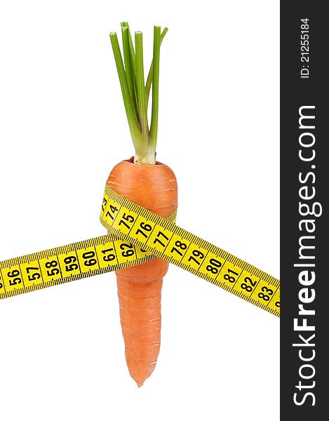 Carrot with a measure tape wrapped around isolated over a white background. Carrot with a measure tape wrapped around isolated over a white background