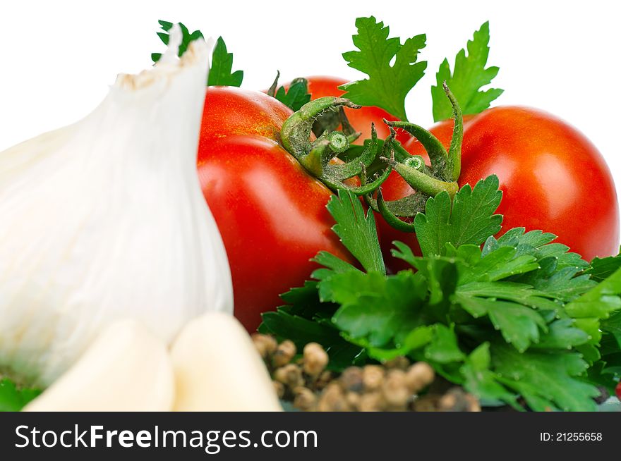 Fresh vegetables on white background - tomato, parsley, garlic, pepper