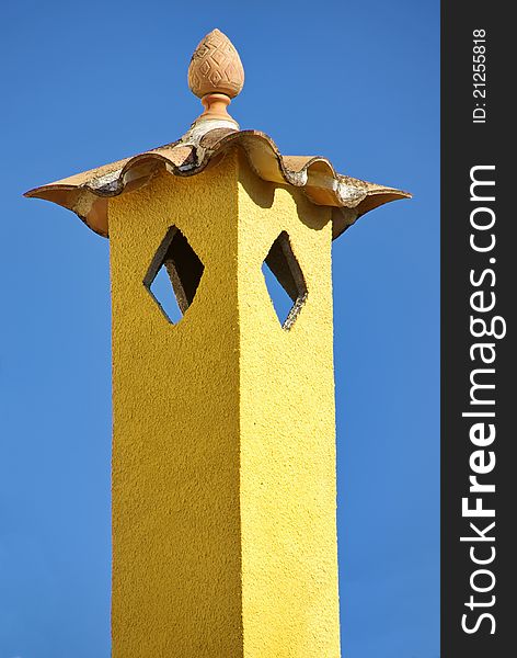 Typical yellow chimney in Majorca (Balearic islands - Spain)