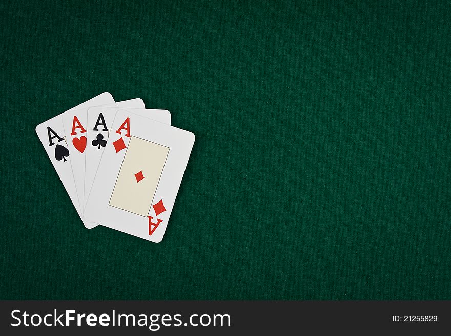 Pair of aces on green table poker