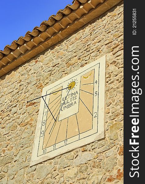 Ancient solar clock on the wall of a rural spanish house in Majorca (Balearic Islands - Spain). Ancient solar clock on the wall of a rural spanish house in Majorca (Balearic Islands - Spain)