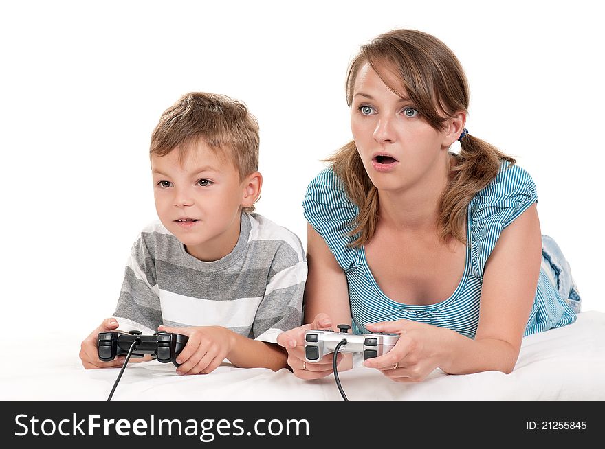 Happy family - mother and child playing a video game. Happy family - mother and child playing a video game