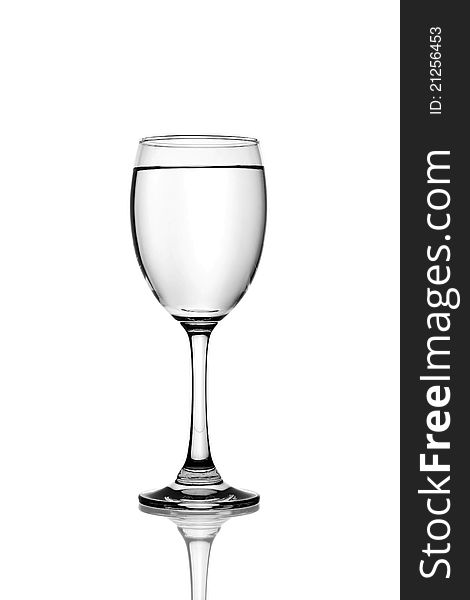 Glass of table-water. Isolated on a white background. Glass of table-water. Isolated on a white background