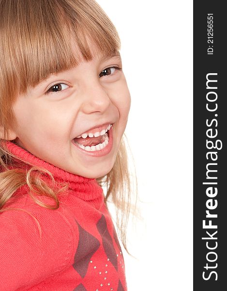 Portrait of a pretty little girl in sweater on white background