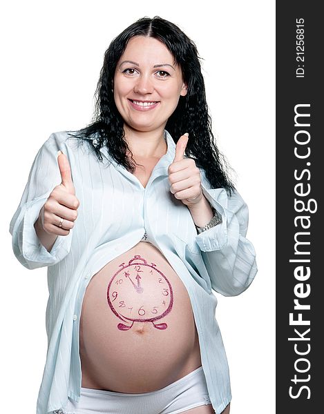 Tummy of pregnant woman with funny drawing over white background. Tummy of pregnant woman with funny drawing over white background