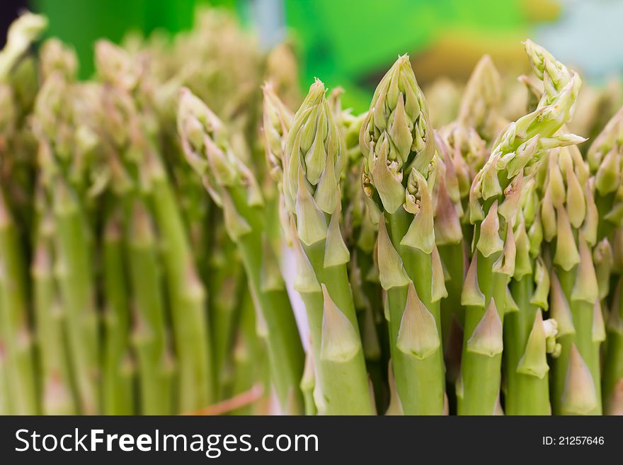 Image of a close-up of asparagus stalks in market