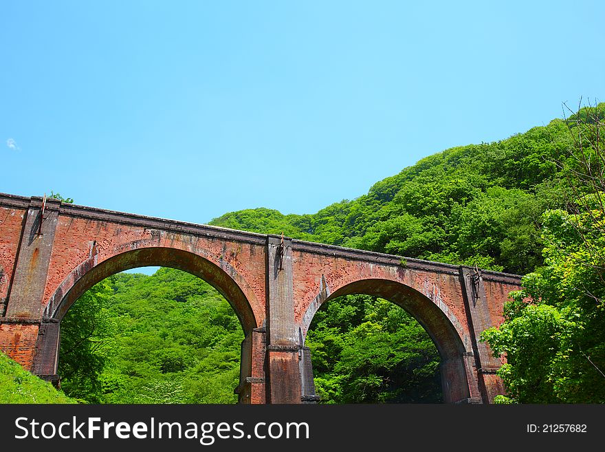 Old railroad bridge of brick work in Japan