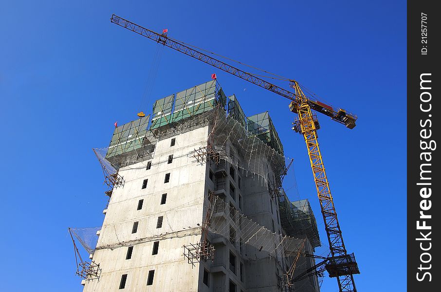 View of a crane in construction.