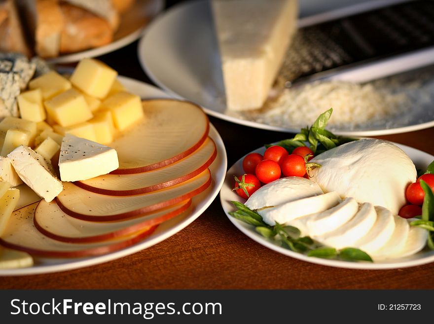 Various types of cheese and bread. Various types of cheese and bread