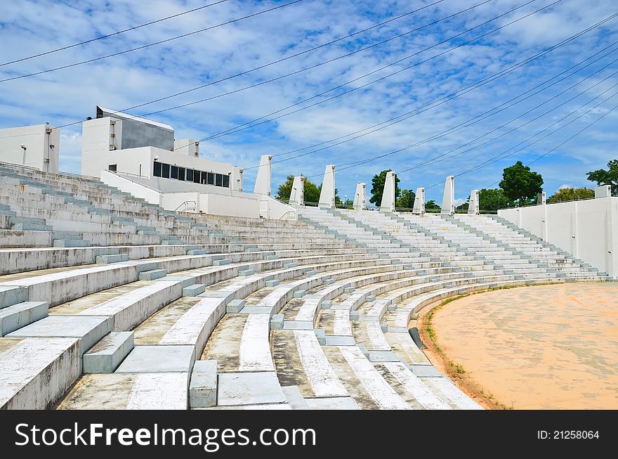 Amphitheater Seats empty, with a beautiful sky.