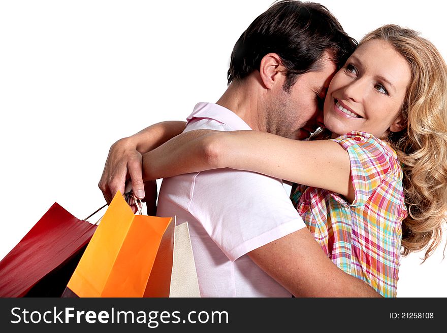 Portrait of a couple with shopping bags. Portrait of a couple with shopping bags