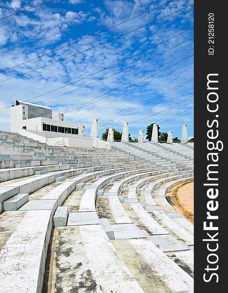 Amphitheater Seats empty, with a beautiful sky.