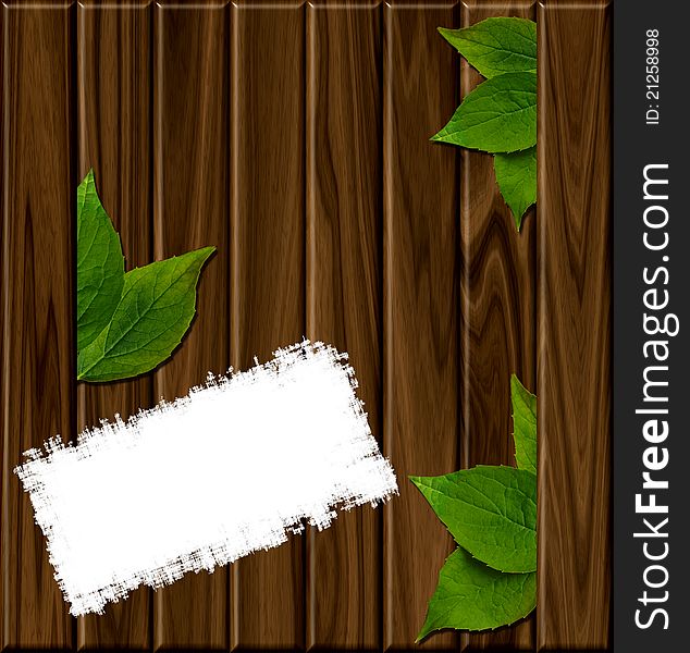 Wooden background with green leaves and place for text