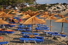 Umbrellas And Deck Chairs On The Sandy Beach Royalty Free Stock Photo