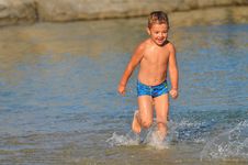 Boy Running Down The Beach Royalty Free Stock Photo Boy Running Down The Beach Royalty Free Stock Photo
