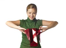 Surprised Crafty Young Girl Is Opening Gift Bag Stock Photos Surprised Crafty Young Girl Is Opening Gift Bag Stock Photos