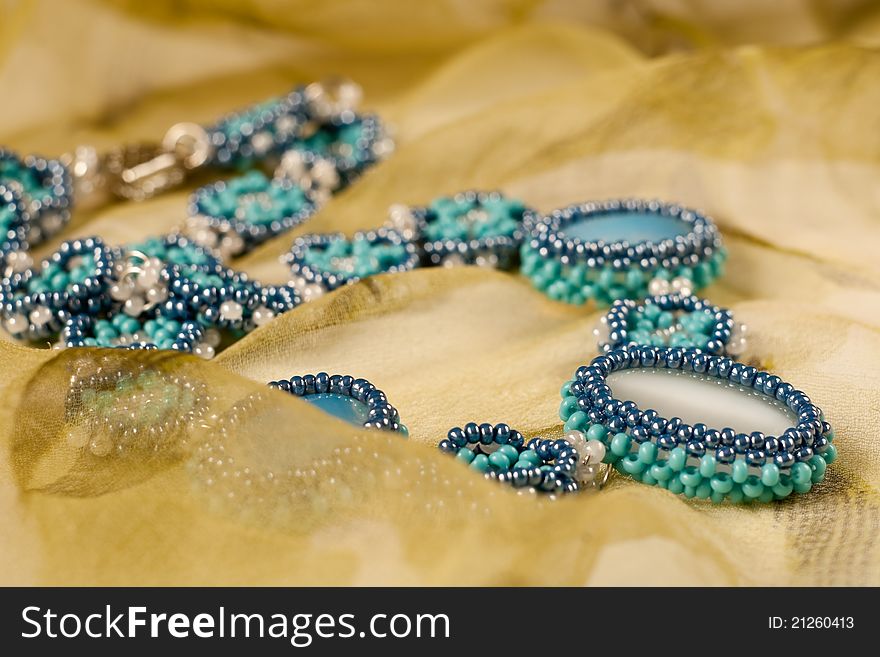 Ornament on a neck from beads and semiprecious stones. Ornament on a neck from beads and semiprecious stones