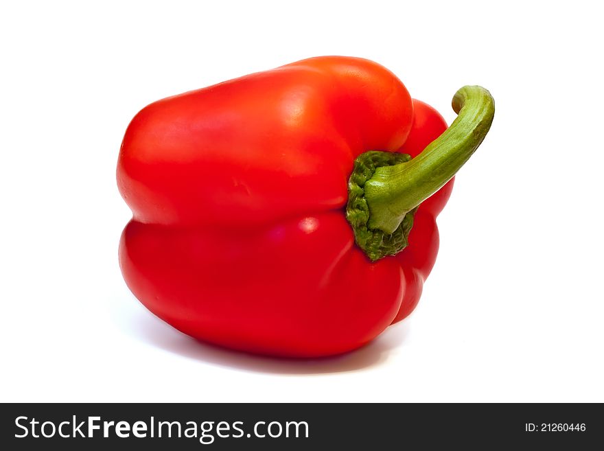 Sweet pepper with a shadow on a white background