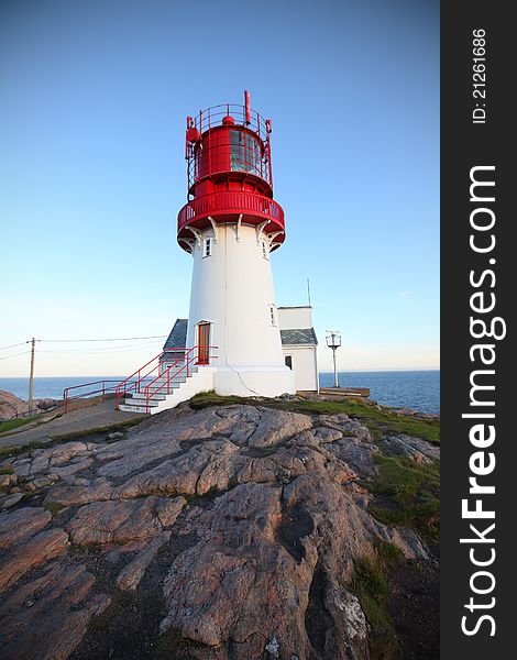 Lighthouse on the rocky hill, southernmost tip of Norway.