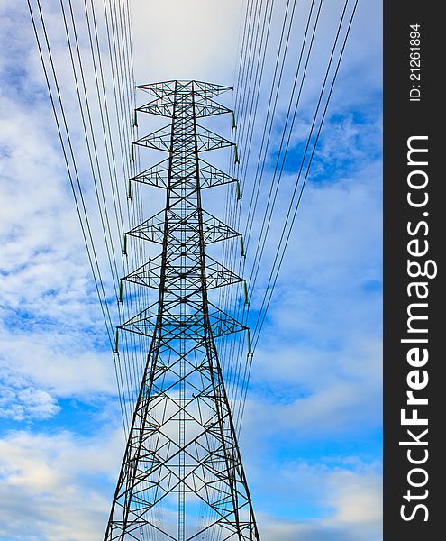 High Voltage Tower On Bright Sky