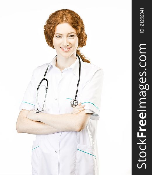 Young doctor isolated on white with a stethoscope. Young doctor isolated on white with a stethoscope