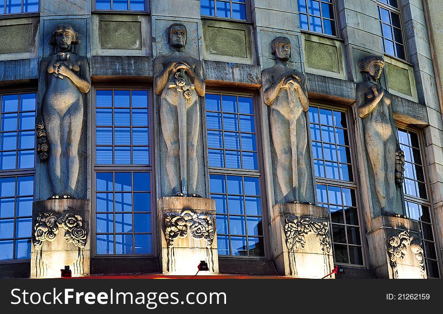 Four statues at the hotel Virgin Oil in the elegant art nouveau