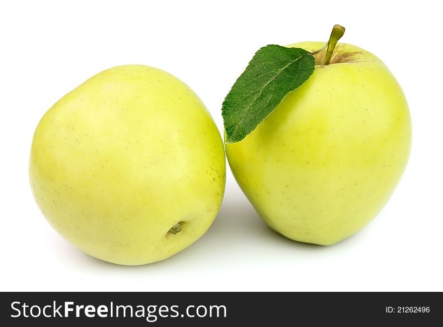 Juicy yellow apples on a white background