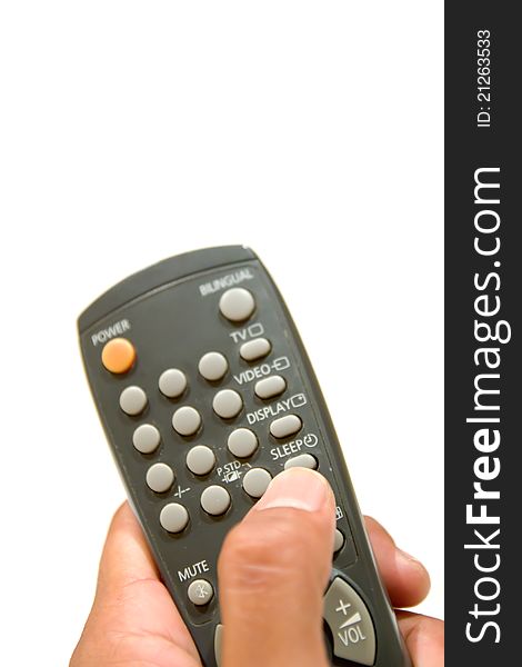 Remote control in hand isolated on white background