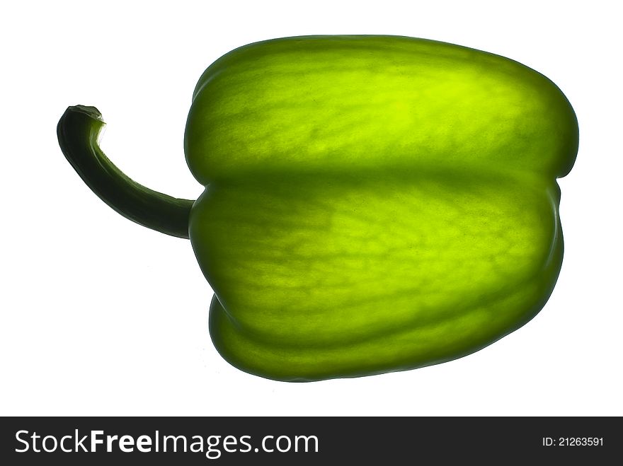 Paprika green on a white background illuminated from the bottom point