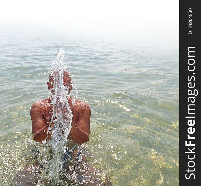 Fun In The Sea - Happy man in a sea