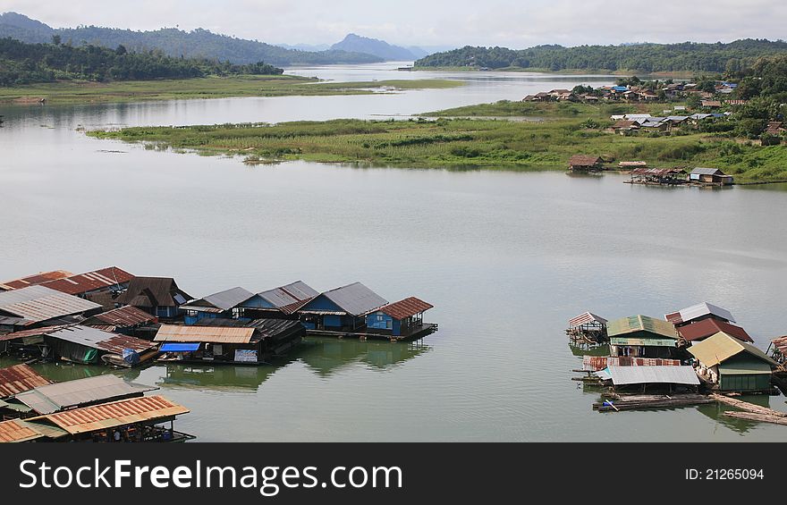 Floating village on the river at Mae Klong river in Kanchanaburi province, Thailand. Floating village on the river at Mae Klong river in Kanchanaburi province, Thailand