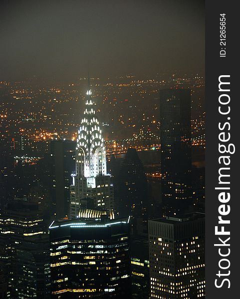 View looking over buildings in New York City at night. View looking over buildings in New York City at night