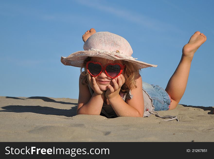 Beautiful Girl On The Sand