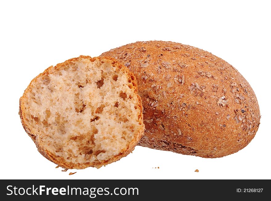 One and half buns with bran isolated on white background