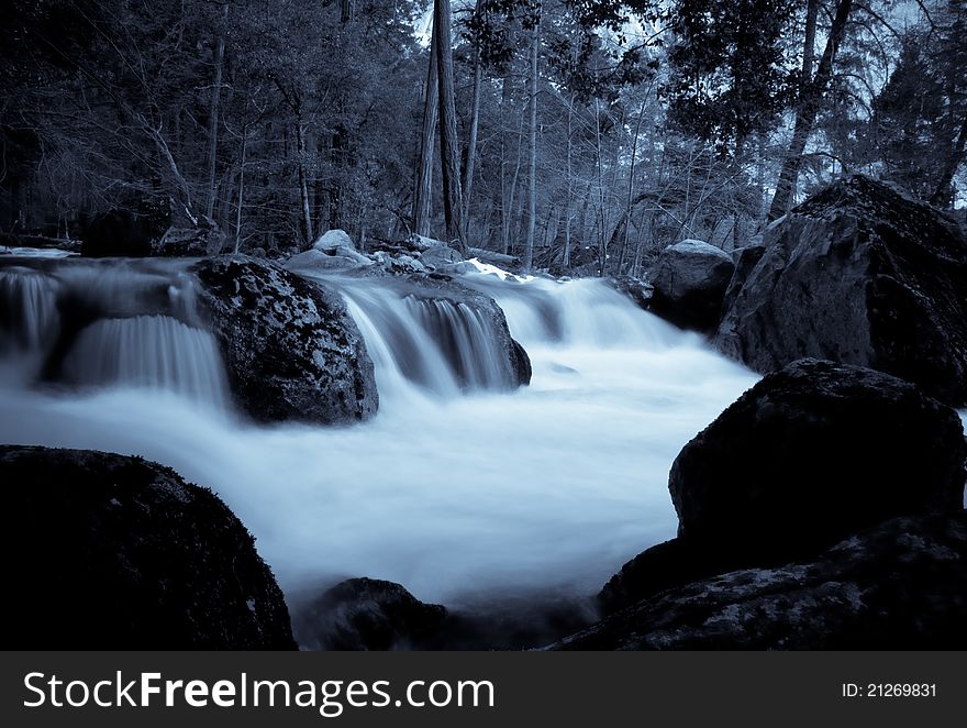 River shot at long exposure to give look of flowing clouds. River shot at long exposure to give look of flowing clouds