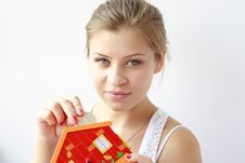 Teenage Girl Putting Coins In Her Moneybox Stock Photo Teenage Girl Putting Coins In Her Moneybox Stock Photo