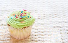 Vanilla Cupcake With Lime Icing Stock Images