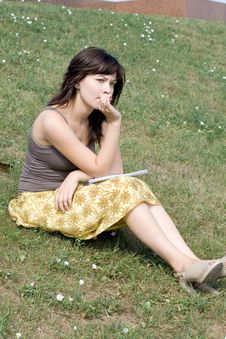 Girl Sitting On Grass Royalty Free Stock Image Girl Sitting On Grass Royalty Free Stock Image